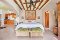 Spend the day at the Soggy Peso Palapa Bar, and spend the night in The Penthouse - Villas