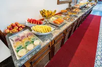 坎皮納斯歐羅套房國民飯店-坎布伊 - 早餐