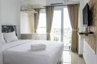 Minimalist Studio Apartment at Poris 88 with City View