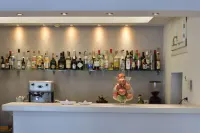 Alexandros Apartments - bar