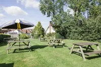 New Flying Horse Inn Hotels near Poulton Wood