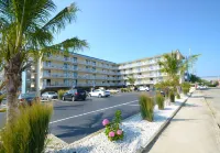Coastal Palms Inn and Suites - Motels