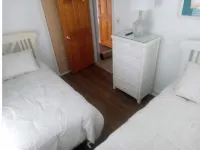 Cozy beach house two blocks from the beach with sunsets over the sound.