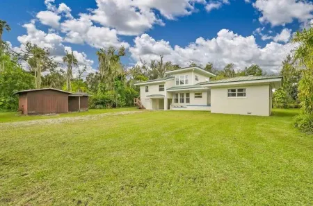 LaBelle Vie, "Riverfront Serenity Bamboo Trails on 3+ acres.