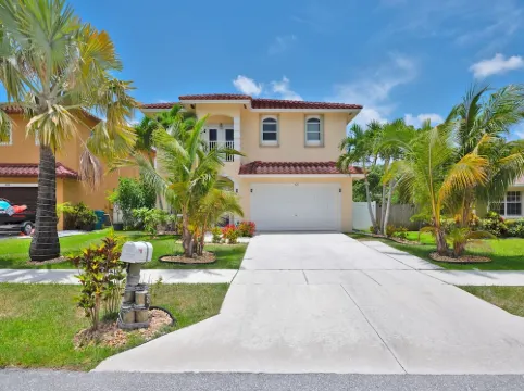 5 Mins to beach; 5BD, 4.5BA, Heated pool, Jacuzzi, Mini Golf, Tiki Huts.