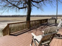 Large house surrounded by farm land along the Republican River.