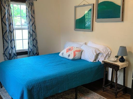 Peaceful home in town. Great location--walk downtown to stores and restaurants.
