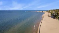 Lake Michigan Sunset Views from updated Macatawa home w/private beach access