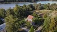 Spacious house with lake view, garden and rowing boat on the Beetzsee Hotels in Pawesin