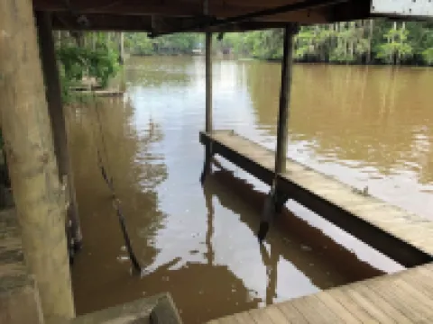 Two Story House with Deck over the River