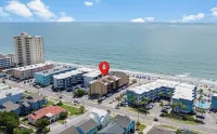 Beautifully Relaxing Condo on the Ocean. Feet from the Beach! after Deck 103