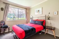 A house in Wentworth Falls with a great entertaining deck, firepit & wood burner