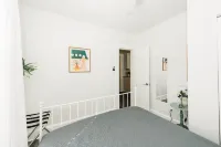 An Art-Filled Garden Apartment Near Parks and Downtown