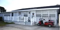 ALMOST HEAVEN! Come enjoy this PET FRIENDLY 3br 2ba sleeps 8 oasis + golf cart