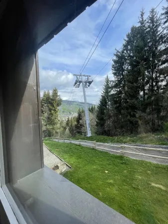 Calme Centrale Verdoyant Отели в г. Межев