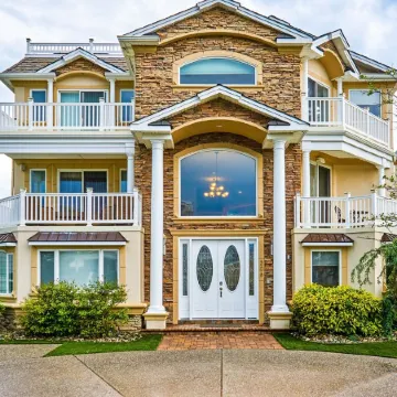 Seaside Beach Mansion w/9 Bedrooms, 8 Full Baths, Pool, Elevator & Rooftop Deck.