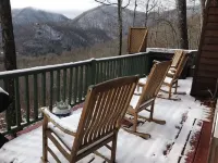 Enjoy the beautiful view of the mountains in your private hot tub!  Pet friendly