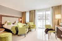 Wellness und Gartenhotel Heusser Bad Dürkheim Hotels in der Nähe von Ritterstein "Hexenstein"