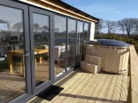 Cleeves Cabins, Arran Lodge with Hot Tub Luxury Hotels in West Kilbride