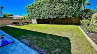 Sunny Surfside Stay – 4BR, Pet-Friendly w/ BBQ Patio Just Steps to the Beach! Hotels near Cambro Manufacturing Co