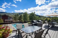 Mountain Views and Heated Pool - Stunning Two Level Retreat