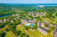 Deluxe condo with a screened patio, electric fireplace, pools, tennis, & gym Hotels near Table Rock Lake