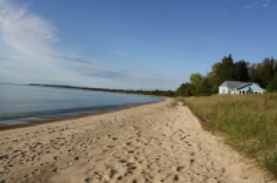 8 Miles Of Sand Beach To Explore ~ Outstanding Sunset Views Over The Lake!