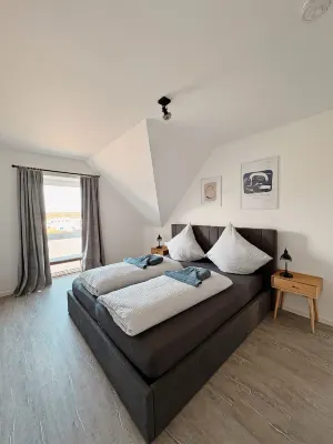 Apartment KÖÖK III Heimathafen - modern, balcony, close to the beach Hotels near Neuharlingersiel harbour