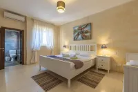 Idyllic Farmhouse with Pools and Views Hotels in Qala