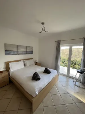 Modern villa with private pool and stunning views down to Monte Clerigo beach