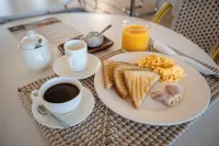The Palm Bay Club Hotel Lodge - Breakfast
