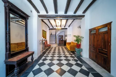 7 Pisos Casa Rural de Pueblo Отели в г. El Comtat