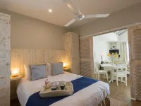 Le Nautique Beachfront Apartments Hoteles en Anse Royale