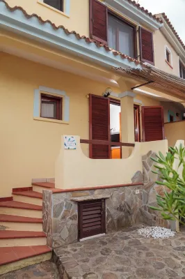 "Vacation Home in Budoni Limpiddu: A Few Steps from the Sea, Perfect for Families"