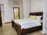 Beachfront Opulence: A Luxurious Three-Bedroom Haven with Breathtaking Sea Views Hotels in Kilifi