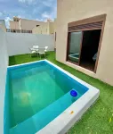 Charming 2-bedroom house with AC and WiFi in gorgeous Chicxulub Beach Hotels in Chicxulub Puerto