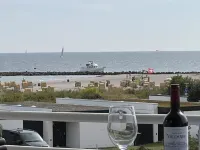 Sunny balcony with sea view directly on the beach