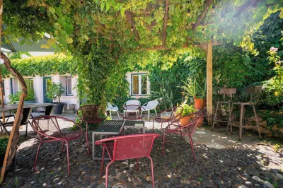 Casa do Patio by Shiadu Отели рядом с достопримечательностью «Байрру-Алту»