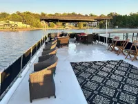 Stunning 3-bedroom house boat in Charlotte with optional cruises available.