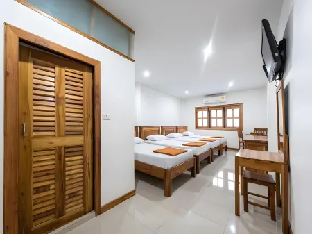 Thongphaphum Place Отели рядом с достопримечательностью «Wat Khuan Khao Laem»