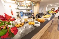 赫米蒂奇飯店 - 早餐