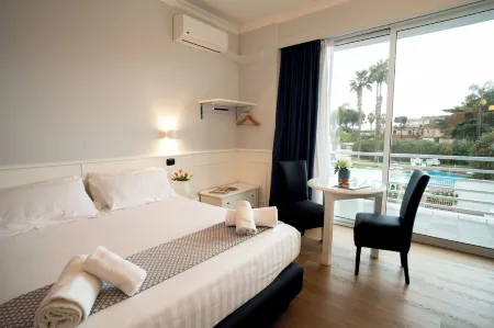 Hotel Barbarella Отели в г. Квалиано