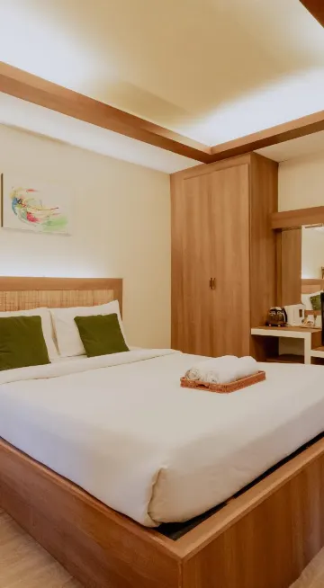 ห้องดีลักซ์ เตียงใหญ่ พร้อมระเบียง