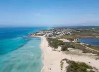 Monolocale Riva – Wi-Fi, Clima e Giardino a Torre Lapillo