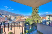 Laura's Cozy Apartment: with Balcony, Lift, Parking in Stresa Centre - Happy Rentals - 2 stelle