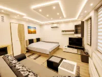 Elegant Ground-Floor Studio with Covered Terrace and Direct Access to Nature - 3-Star
