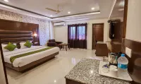 Treebo Grand Legacy Elite with Roof Top Cafe Hotels near ShivPuri Mata Mandir