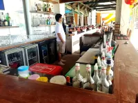 Calypso Beach and Dive Resort - bar