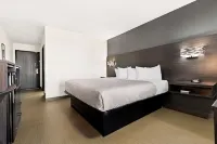 Econo Lodge Dumas Отели в г. Дюма