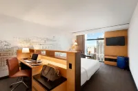 هوتل بور كيبيك، إيه تريبيونال بورتفوليو هوتل